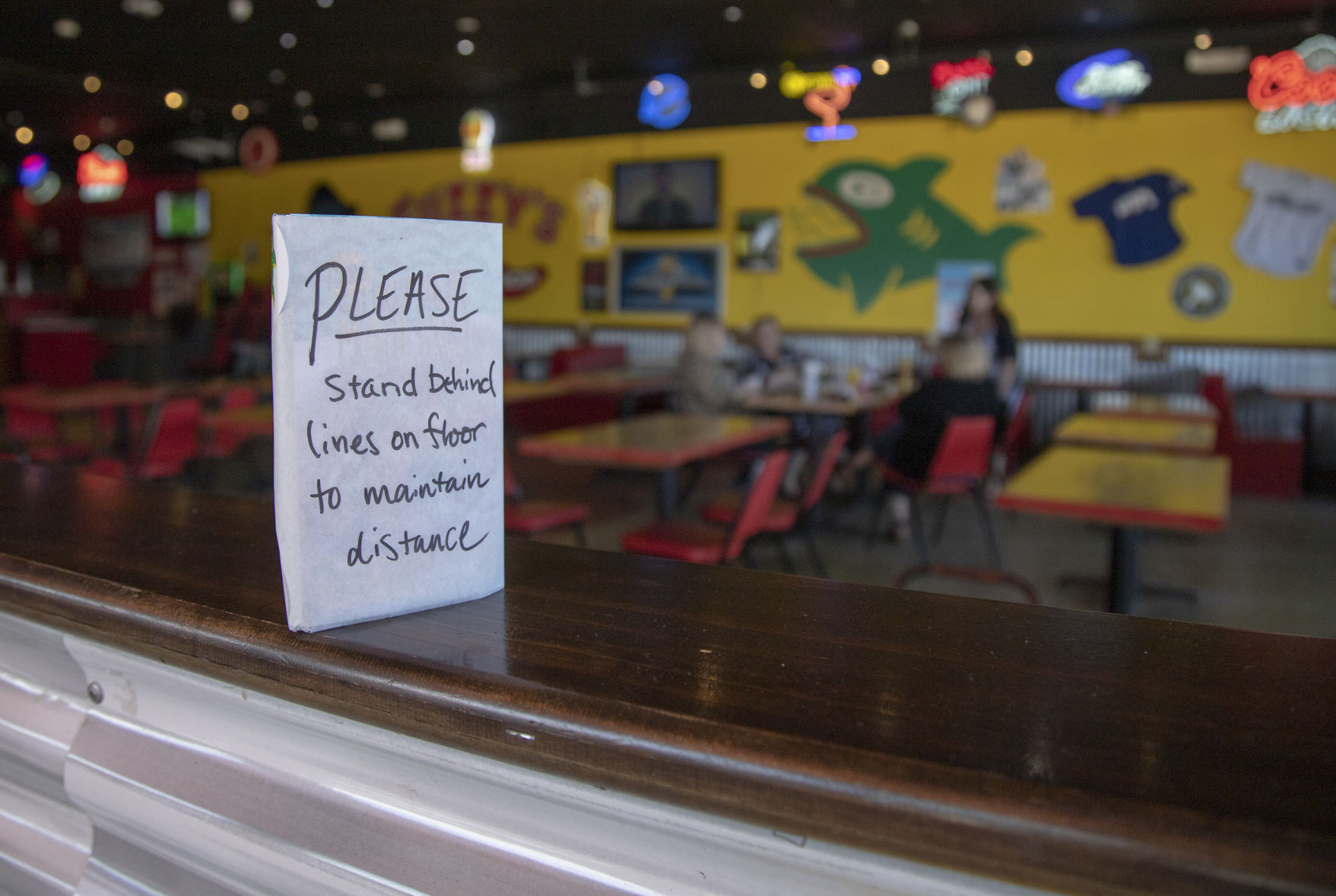 After over a month of self-isolation, Texans react to businesses reopening under restrictions